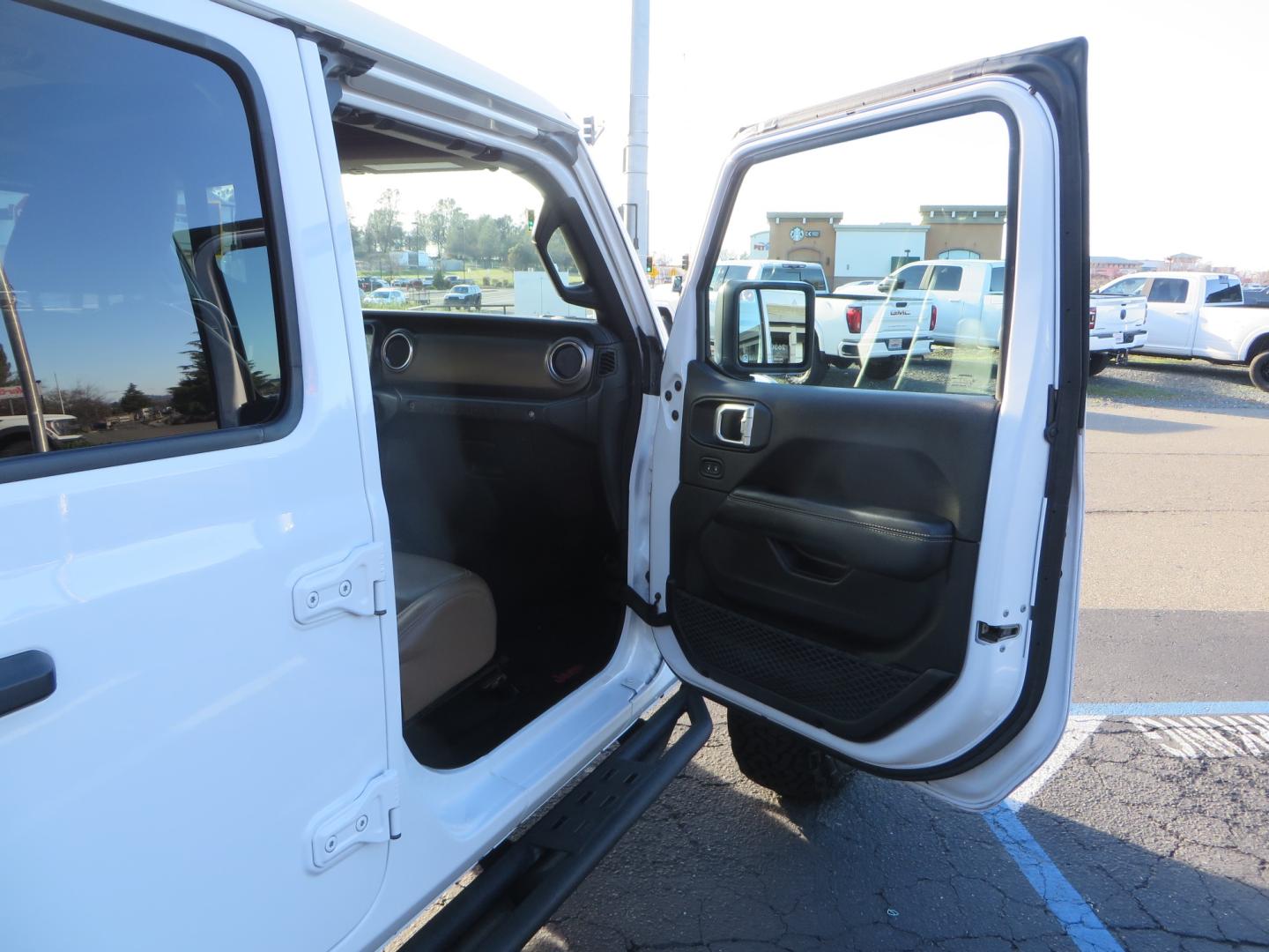 2020 White /TAN Jeep Wrangler Unlimited Rubicon (1C4HJXFG8LW) with an 3.6L V6 DOHC 24V FFV engine, 6A transmission, located at 2630 Grass Valley Highway, Auburn, CA, 95603, (530) 508-5100, 38.937893, -121.095482 - 3" Zone offroad suspension system, Fox adventure series shocks, rocksliders, Teraflex HD tire relocation, Mopar HD tailgate hinge, 17" KMC wheels, and 37" BFG KO2 tires. - Photo#45